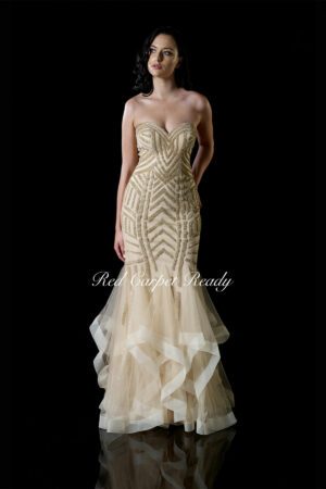 Gold fishtail dress with sparkly panels to the bodice.