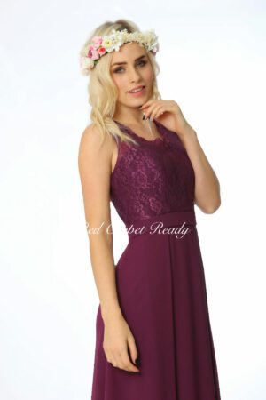 Chiffon bridesmaids dress with a v-neckline and floral lace detailing.