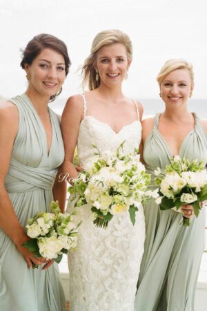 Sleeveless green bridesmaids dress.