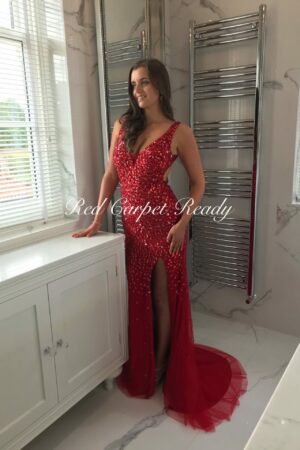 Red hand-beaded dress with a v-neck and leg split.