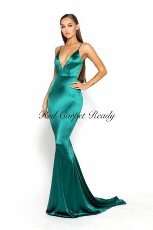 Emerald green bodycon dress with a train, plunging v-neck and straps.