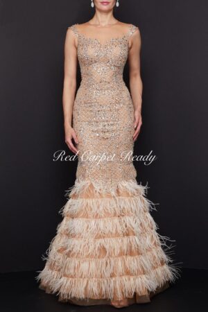 Cream and nude couture fishtail dress with crystal embellishments and an illusion neckline.