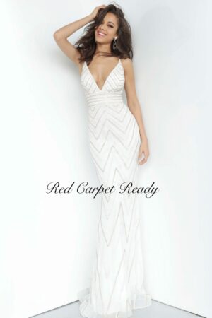 Tight fitting white dress with sequin embellishments, a low-cut v-neck and straps.