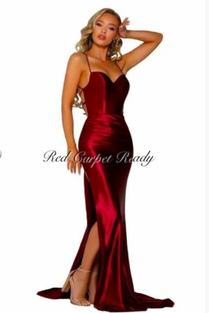 Slinky deep red dress with a leg split and straps.