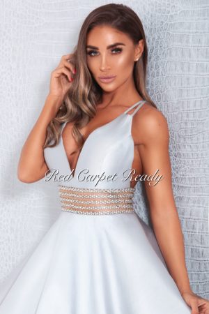 Silver ballgown with a crystal waist belt, v-neck and straps.