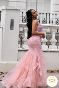 Blush fishtail, fully ebellished with a corset back