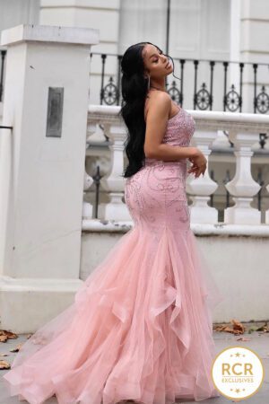 Blush fishtail, fully ebellished with a corset back