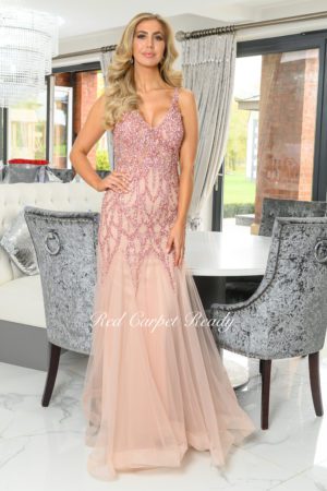 blush pink fishtail dress with crystal embellishments to the bodice and a v-neck.