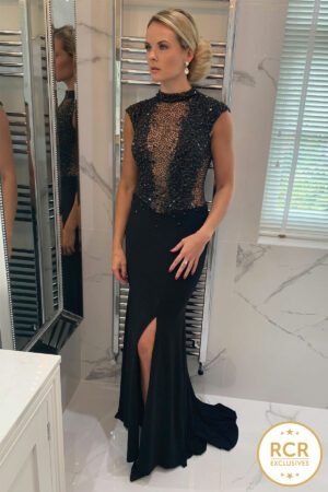 Maxi-length dress with a black crystal embellished bodice and high-neckline, joined with a black skirt containing a leg split.