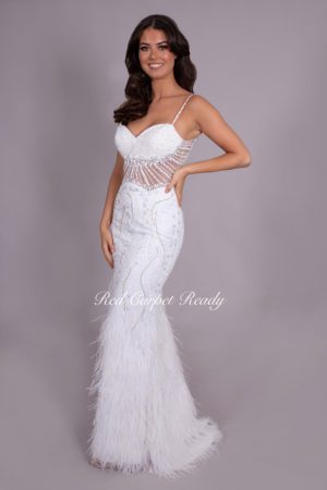 White mermaid dress with sequin embellishments to a see-through corset.