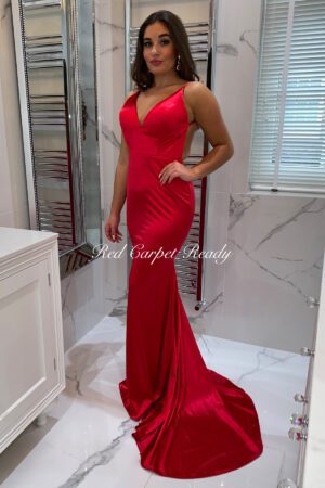 Slinky red dress with a train, v-neck and straps.