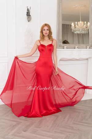 Tight fitting red satin dress featuring a v panel and straps.