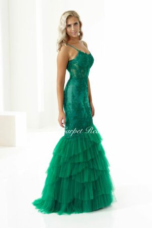 Feathered emerald green fishtail with a corset bodice and straps.
