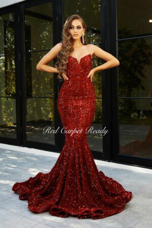 Strapless red fishtail dress with sparkly sequin embellishments.
