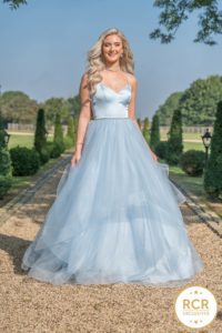 Baby blue princess dress, completed with shimmering belt and corset back