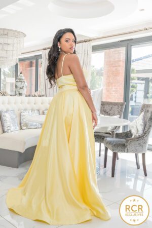 Yellow satin ballgown with a v-neck and straps.