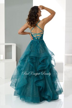princess ballgown, with tiered ruffles and a flattering corset back. This dress is embellished witha floral bodice and belt.