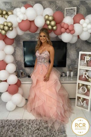 Dramatic blush pink ballgown with bardot neckline and overskirt