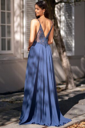 A-line V-neck dress with a leg slit and detailing on the bodice