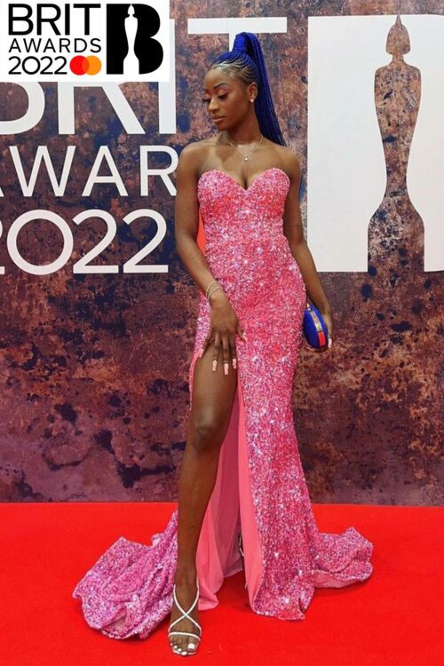 nife brit awards 2022 pink sparkling strapless dress with a leg slit