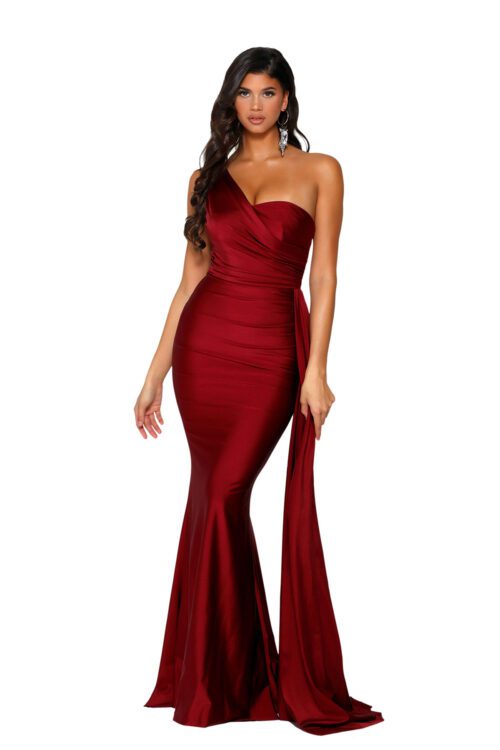 Deep red prom and evening gown with side train.