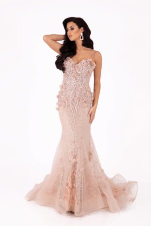 Nude mermaid dress featuring intricate crystal and floral embellishments.