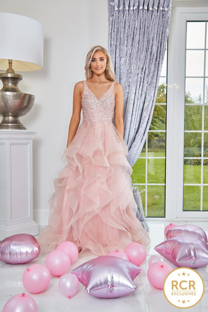 blush ruffle ballgown with a crystal encrusted bodice & a low back