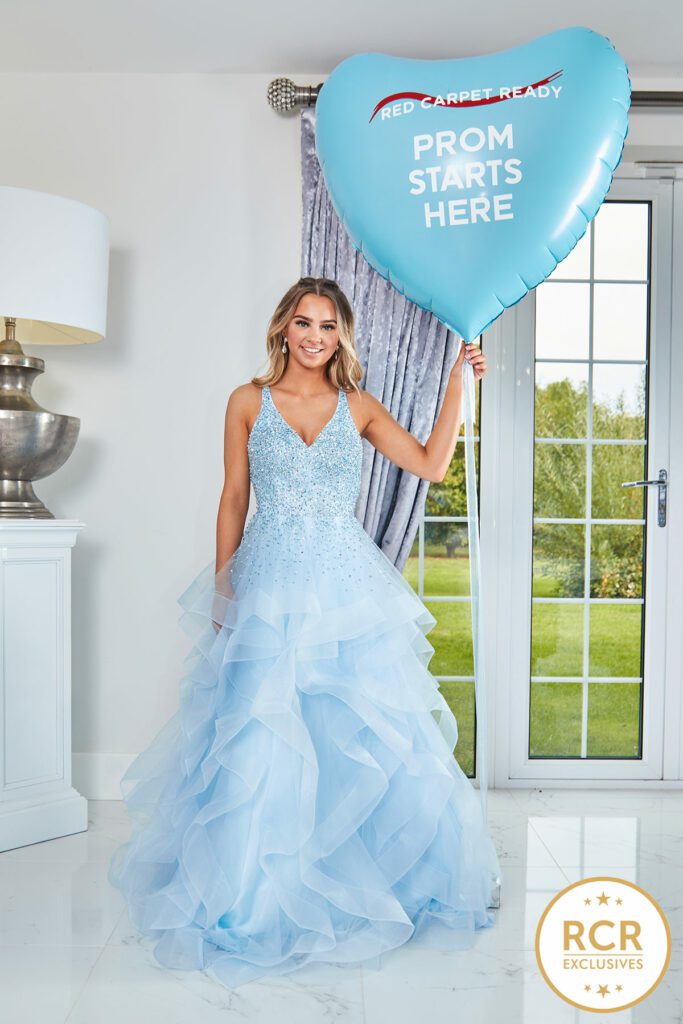 baby blue ruffle ballgown with a crystal encrusted bodice & a low back