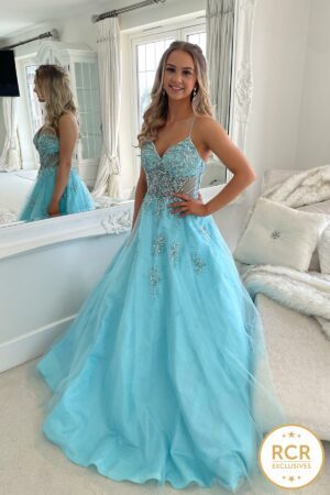aqua princess ballgown with detailed embellishments and a flowing skirt