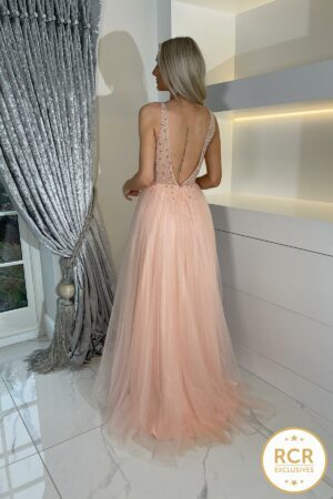 Blush A-line princess dress with a sparkly, intricately beaded bodice, complemented with a low-cut v-neck, open-back and discreet leg-split