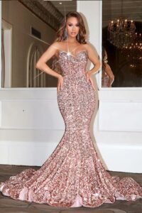 Slinky strapless fully embellished gown with train