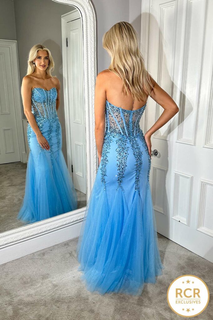Strapless fishtail prom dress with embellished details on the bodice and waistline.