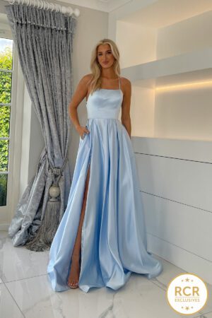 A Satin Ballgown Prom dress with an open laced back, detailed waistband and straps.