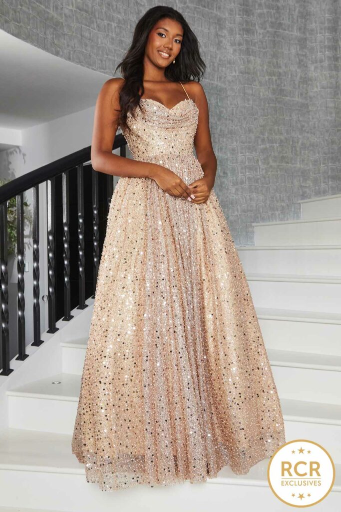 Champagne fully embellished prom dress with a lace up back
