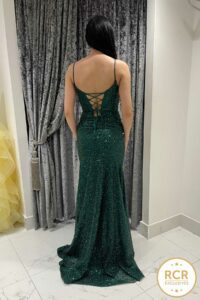 sparkling emerald prom & evening dress with a leg slit, plunging neckline & corset back