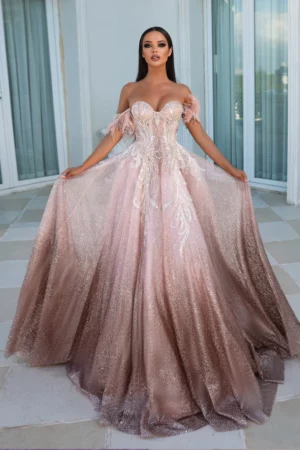 This off the shoulder couture Ballgown will ensure you are the centre of attention with glitter detailing that shimmers in the light!