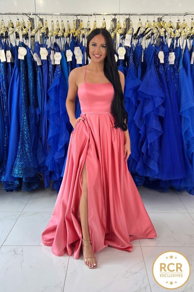 Pink Satin A-line Prom dress with an open back and detailed waistband.