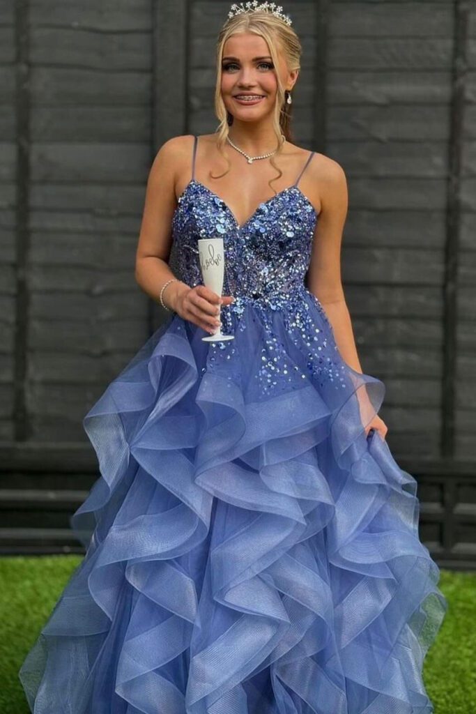 Phoebe Prentice wearing a ruffle ballgown in Indigo to her Prom.