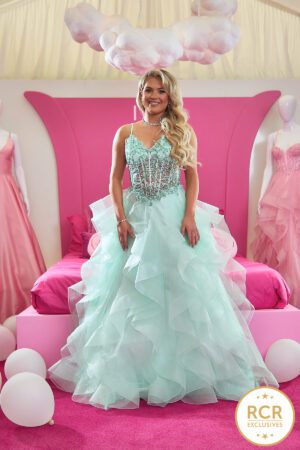 A Mint V-neck Ruffle Prom Dress with a tone on tone embroidered bodice, Straps and a zip up back.