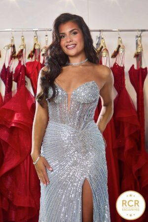 A fully embellished silver slinky Prom & Evening Dress which sparkles in the light.
