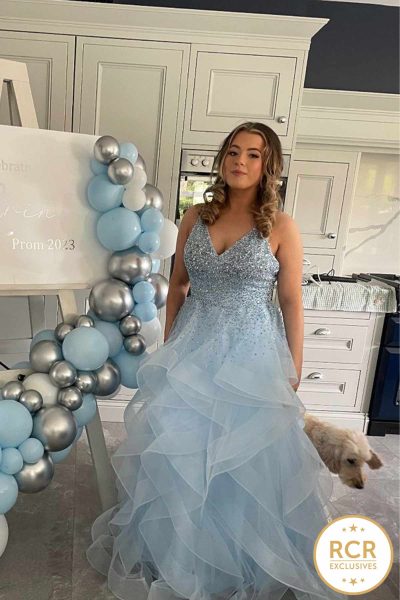 Baby Blue Prom dress with a V neckline, ruffled layered skirts and a gorgeous embellished bodice that sparkles in the light.