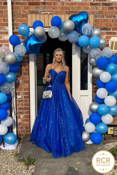 This Royal Blue Princess ballgown with a corset back will ensure you are the centre of attention, with glitter detailing that shimmers in the light.